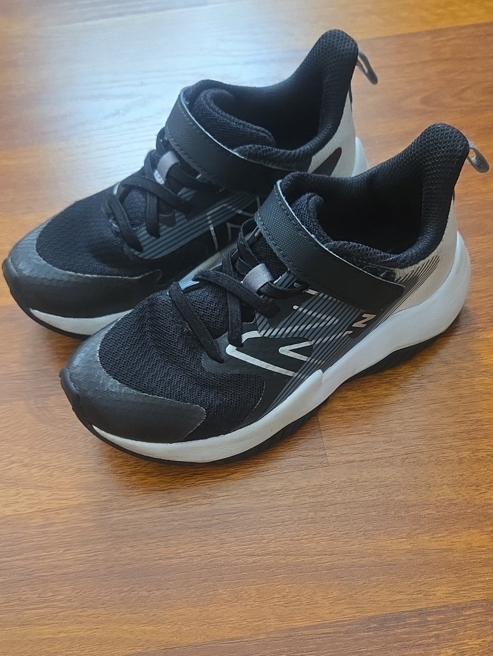 New Balance Kids Black and White Athletic Sneakers